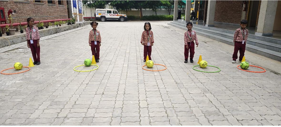 Rolling the ball with a Frisbee